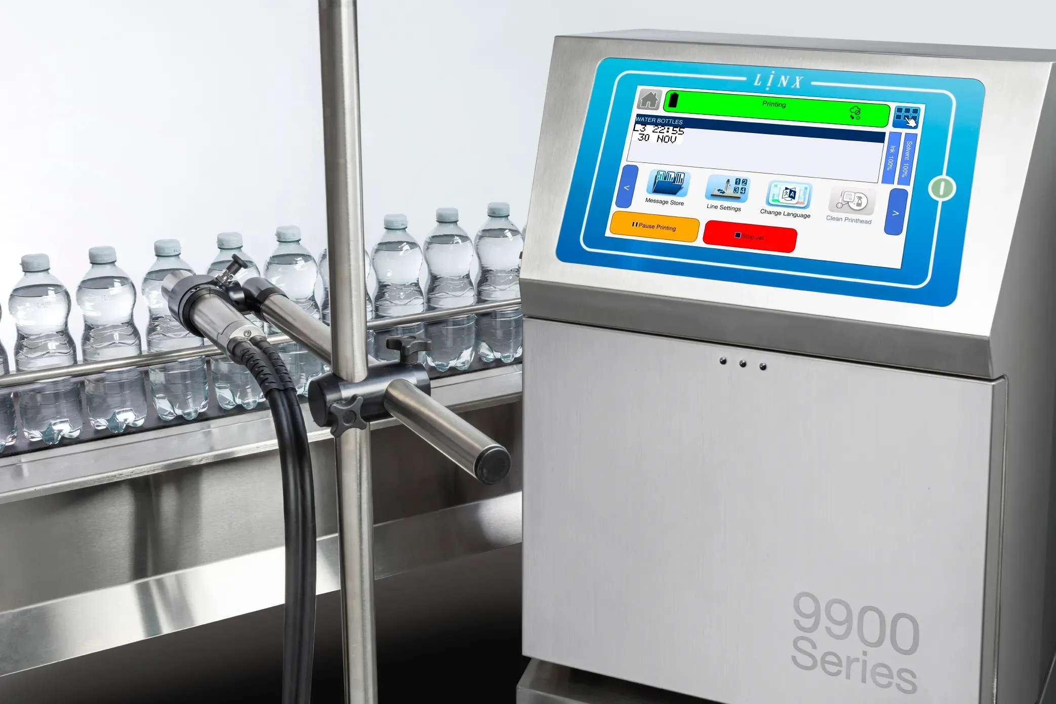 Linx CIJ printer coding water bottles on a conveyor